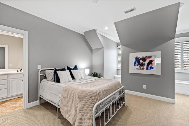 bedroom featuring visible vents, connected bathroom, crown molding, baseboards, and light colored carpet