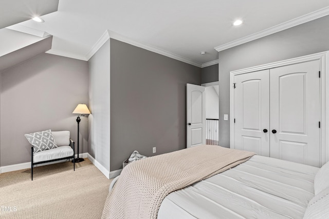 bedroom with baseboards, recessed lighting, a closet, crown molding, and light colored carpet