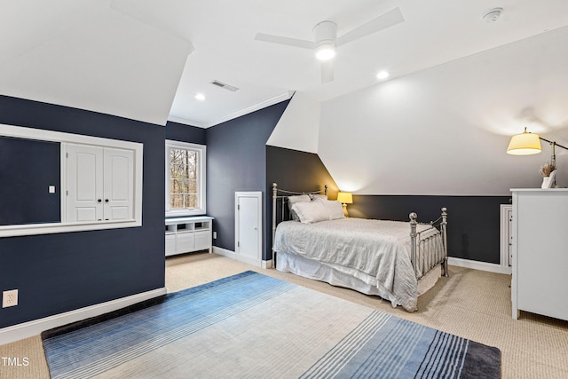 bedroom with baseboards, lofted ceiling, carpet, and visible vents