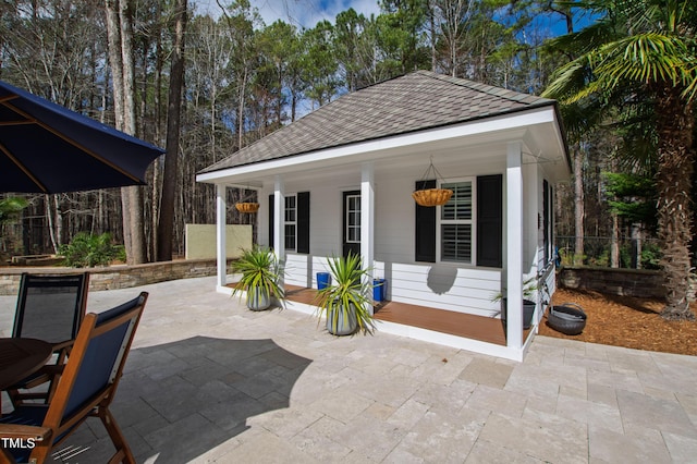 view of patio / terrace featuring fence