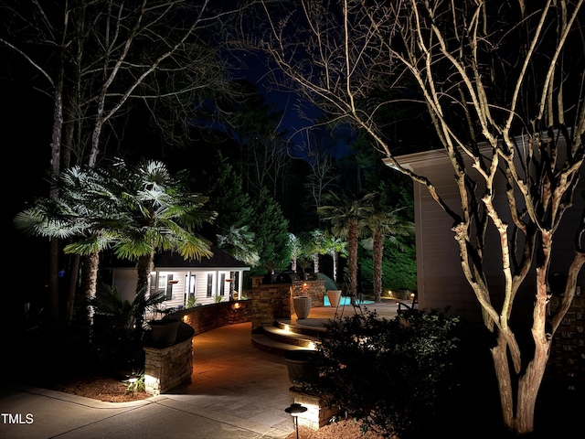 view of patio with an outdoor structure