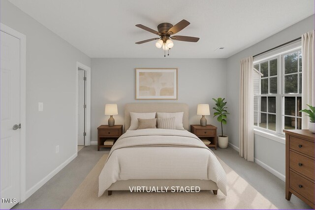 5625 Fieldcross Ct, Raleigh, NC 27610 - bedroom featuring baseboards, light carpet, and ceiling fan