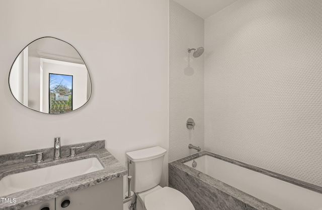 full bathroom with vanity, shower / tub combination, and toilet