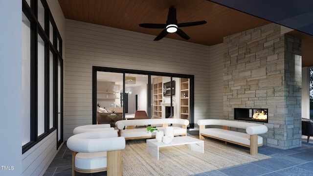 sunroom with wood ceiling, a ceiling fan, and a multi sided fireplace