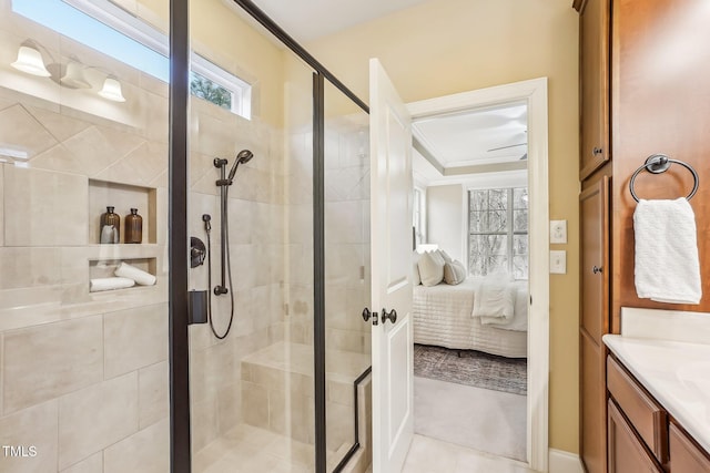 full bathroom with ensuite bathroom, ornamental molding, a shower stall, and vanity