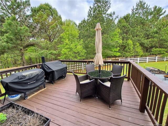 11 Scotland Dr, Spring Lake, NC 28390 - deck featuring outdoor dining area, a grill, and fence