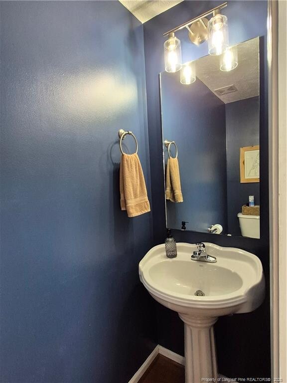 11 Scotland Dr, Spring Lake, NC 28390 - half bathroom with baseboards