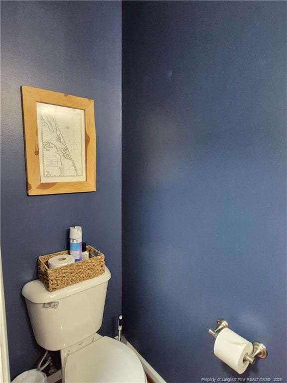 11 Scotland Dr, Spring Lake, NC 28390 - bathroom featuring toilet and baseboards