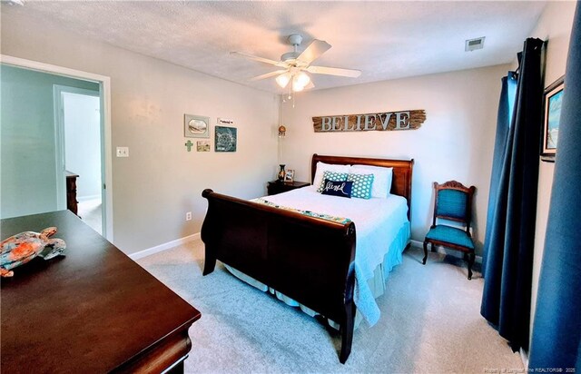 11 Scotland Dr, Spring Lake, NC 28390 - bedroom featuring visible vents, baseboards, ceiling fan, and light carpet