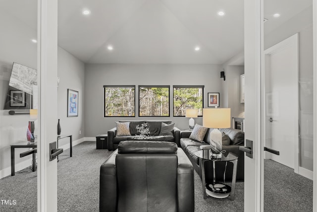 living area featuring lofted ceiling, carpet flooring, and recessed lighting