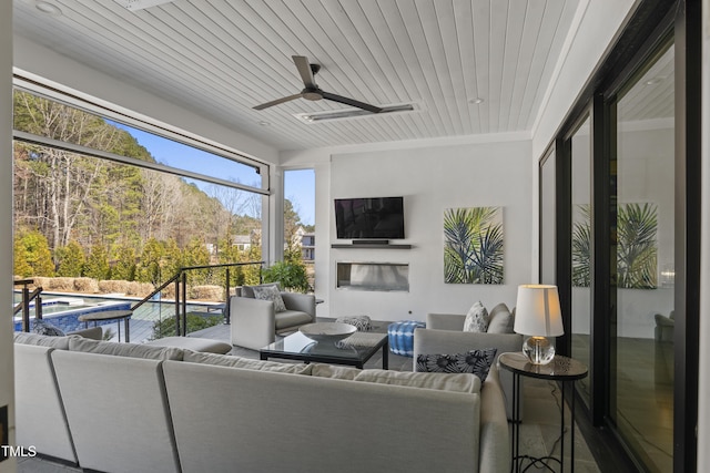 exterior space featuring wood ceiling and ceiling fan