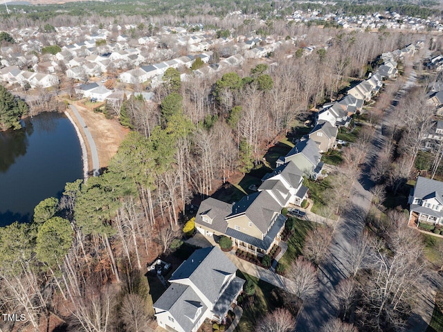 bird's eye view with a water view and a residential view