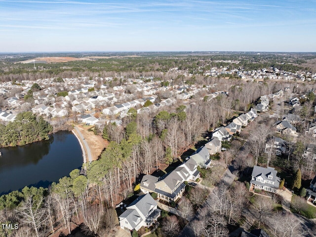 birds eye view of property featuring a water view and a residential view