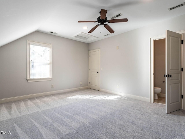 unfurnished bedroom featuring light carpet, visible vents, and baseboards