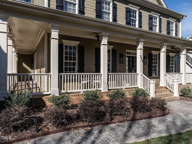 view of front of home with a porch and a ceiling fan