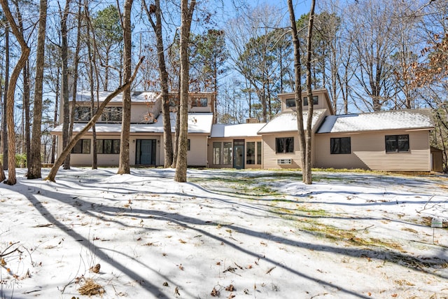 view of snow covered property