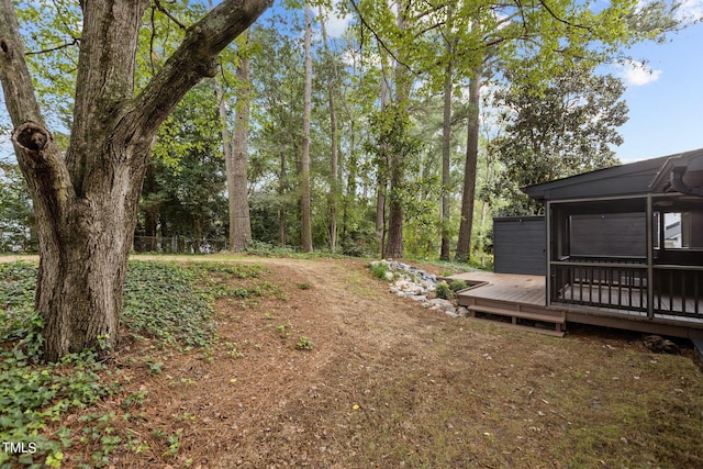 view of yard featuring a deck