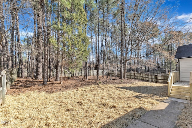 view of yard with a fenced backyard