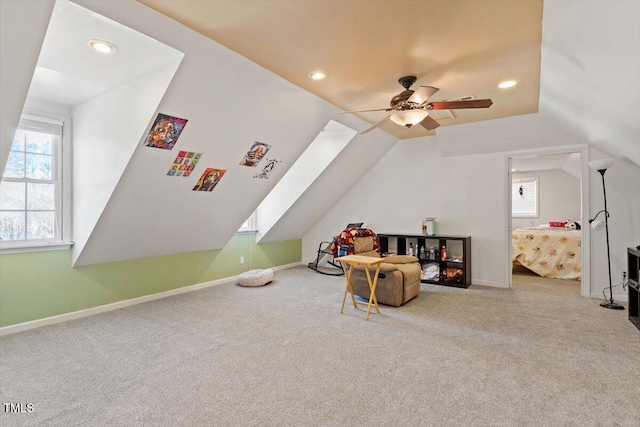 rec room featuring recessed lighting, baseboards, vaulted ceiling, and light colored carpet