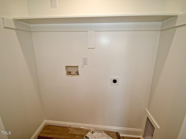 laundry area featuring hookup for a washing machine, laundry area, wood finished floors, baseboards, and electric dryer hookup