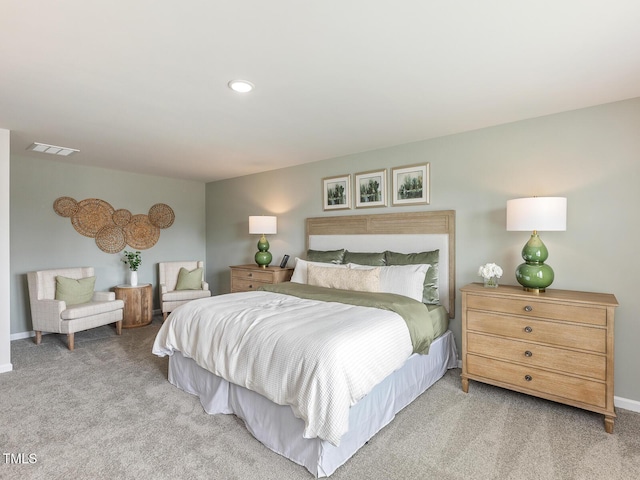 bedroom featuring recessed lighting, light carpet, visible vents, and baseboards