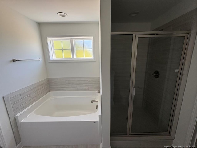 22 Peach Orchard Ln, Lillington, NC 27546 - bathroom with a stall shower and a bath