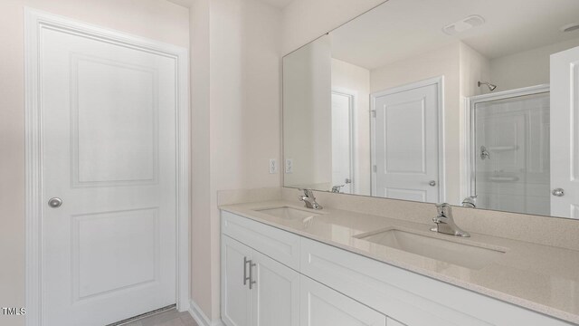 517 Old Battle Bridge Rd, Wendell, NC 27591 - full bath featuring double vanity, a sink, and a shower stall