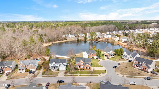 birds eye view of property featuring a residential view and a water view