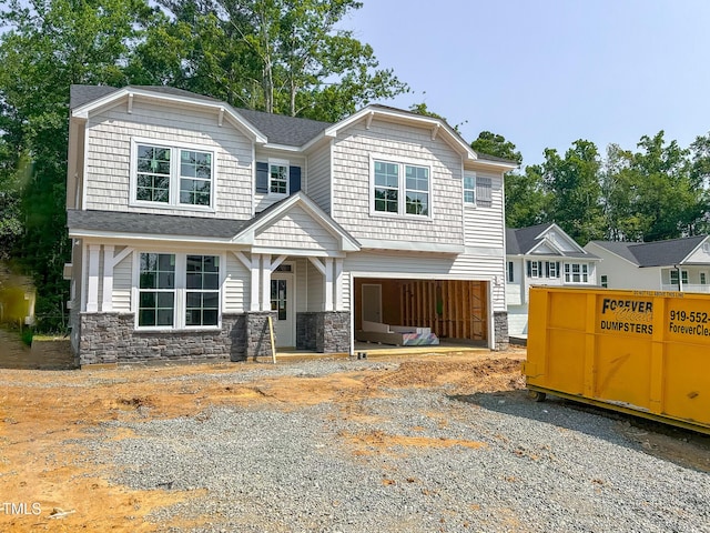 1905 Old Bramble Ln Unit 4, Fuquay Varina, NC 27526 - craftsman house featuring stone siding, a garage, driveway, and roof with shingles