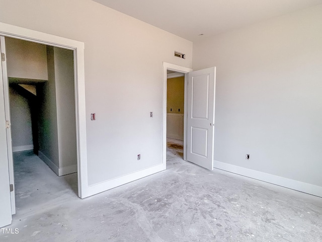 1905 Old Bramble Ln Unit 4, Fuquay Varina, NC 27526 - unfurnished bedroom featuring concrete floors and baseboards