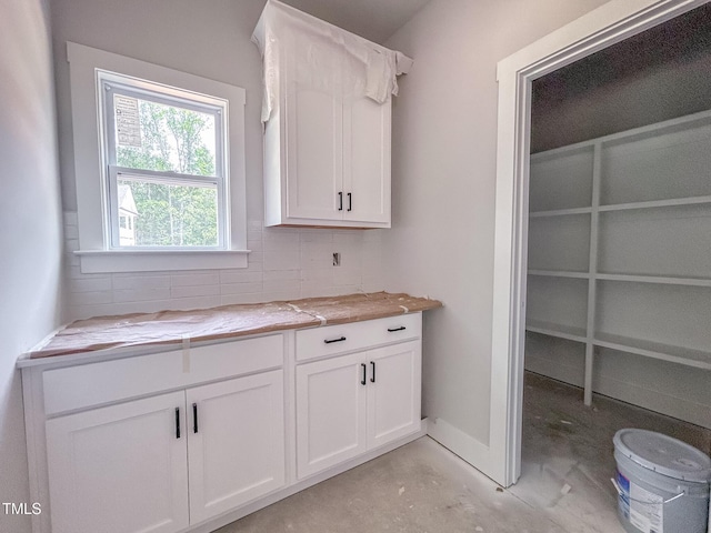 1905 Old Bramble Ln Unit 4, Fuquay Varina, NC 27526 - bathroom with decorative backsplash, concrete floors, and vanity