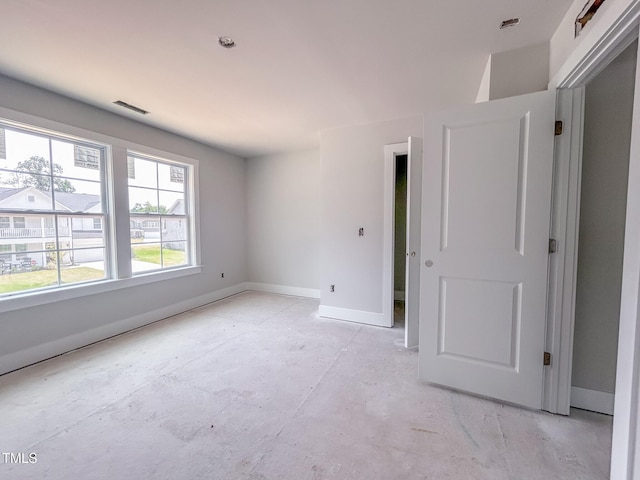 1905 Old Bramble Ln Unit 4, Fuquay Varina, NC 27526 - unfurnished bedroom featuring baseboards and unfinished concrete floors