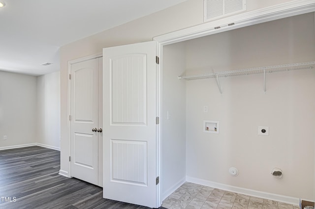 laundry area featuring hookup for a washing machine, visible vents, gas dryer hookup, laundry area, and baseboards