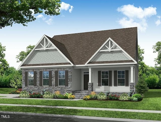 exterior space with a shingled roof and a front yard