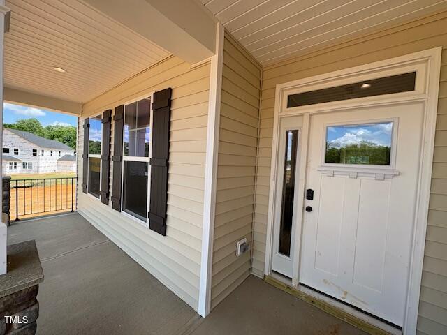 190 Sage Ln Unit 015, Four Oaks, NC 27524 - property entrance featuring covered porch
