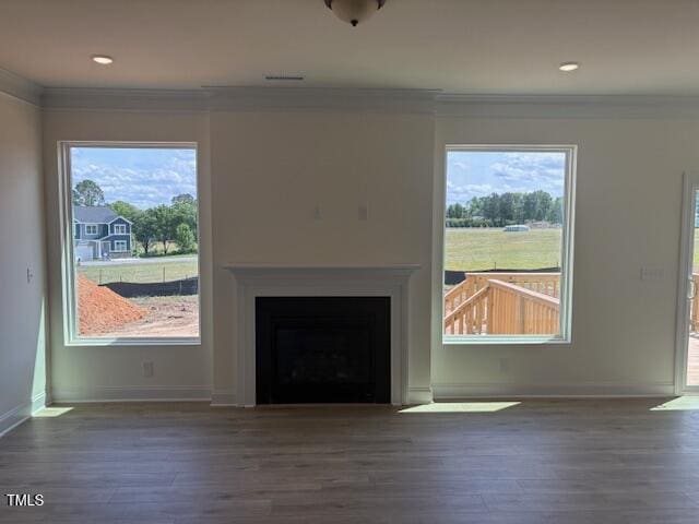 190 Sage Ln Unit 015, Four Oaks, NC 27524 - unfurnished living room with crown molding, baseboards, wood finished floors, a fireplace, and recessed lighting