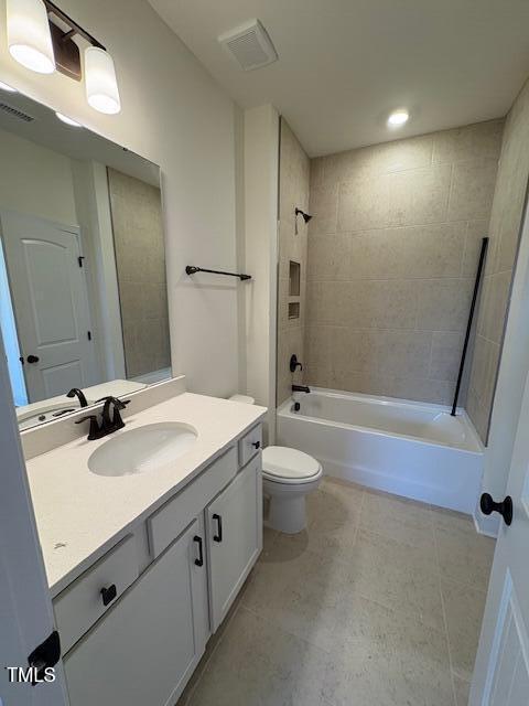 190 Sage Ln Unit 015, Four Oaks, NC 27524 - bathroom with vanity, bathing tub / shower combination, toilet, and tile patterned floors