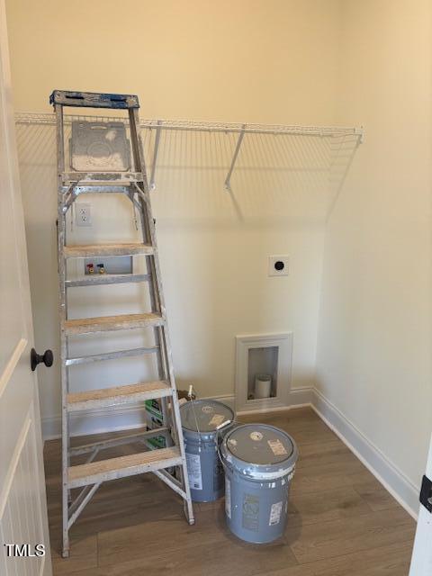 190 Sage Ln Unit 015, Four Oaks, NC 27524 - laundry room featuring electric dryer hookup, wood finished floors, and baseboards