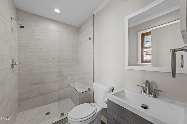 full bathroom with toilet, a shower stall, crown molding, and vanity