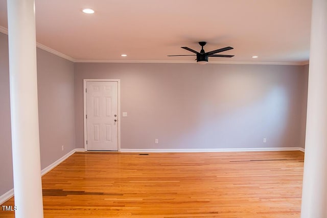 empty room with crown molding, recessed lighting, light wood-style flooring, a ceiling fan, and baseboards