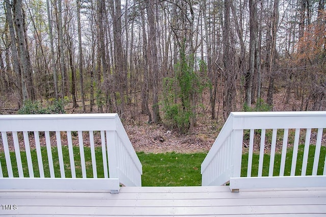 deck featuring a yard