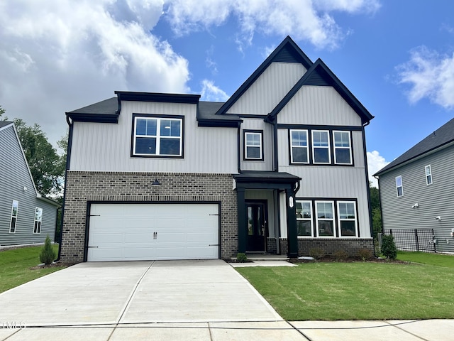 167 S Harvest Ridge Way Unit 223, Wilsons Mills, NC 27520 - view of front facade with brick siding, concrete driveway, and a garage