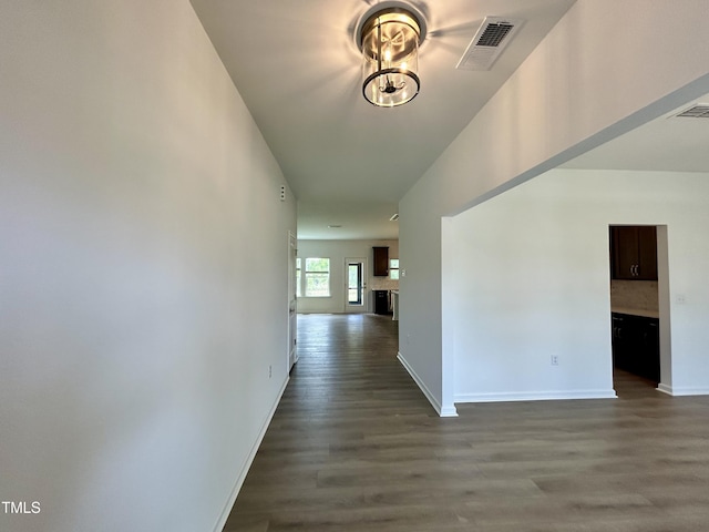 167 S Harvest Ridge Way Unit 223, Wilsons Mills, NC 27520 - hallway featuring dark wood-style flooring and baseboards
