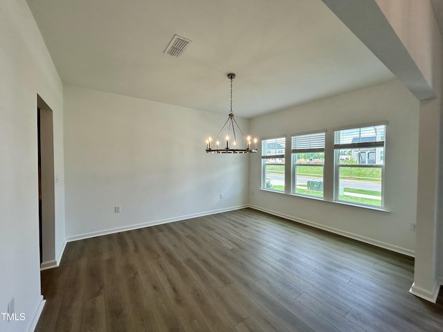 167 S Harvest Ridge Way Unit 223, Wilsons Mills, NC 27520 - unfurnished dining area with a chandelier, baseboards, and dark wood-style flooring