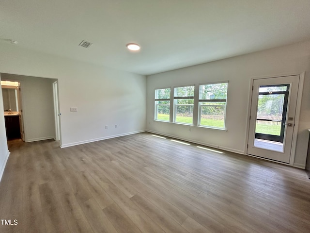 167 S Harvest Ridge Way Unit 223, Wilsons Mills, NC 27520 - unfurnished room featuring wood finished floors and baseboards
