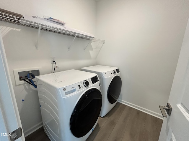 167 S Harvest Ridge Way Unit 223, Wilsons Mills, NC 27520 - washroom with independent washer and dryer, dark wood finished floors, and baseboards