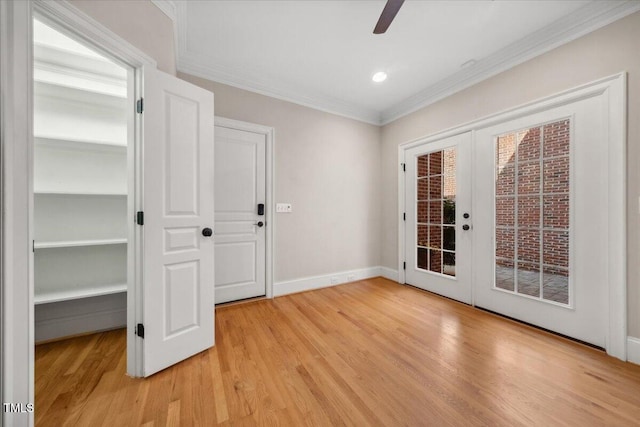 doorway to outside with a ceiling fan, baseboards, french doors, light wood finished floors, and crown molding