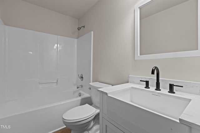 full bath with tub / shower combination, vanity, and toilet