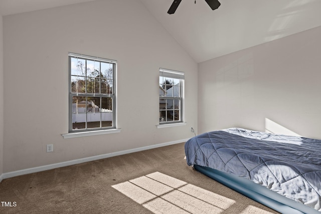 bedroom with high vaulted ceiling, carpet, ceiling fan, and baseboards