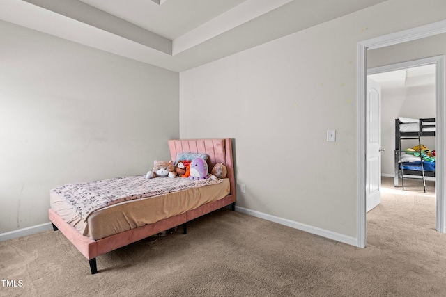 carpeted bedroom with baseboards